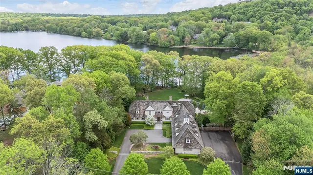 a view of lake with green space
