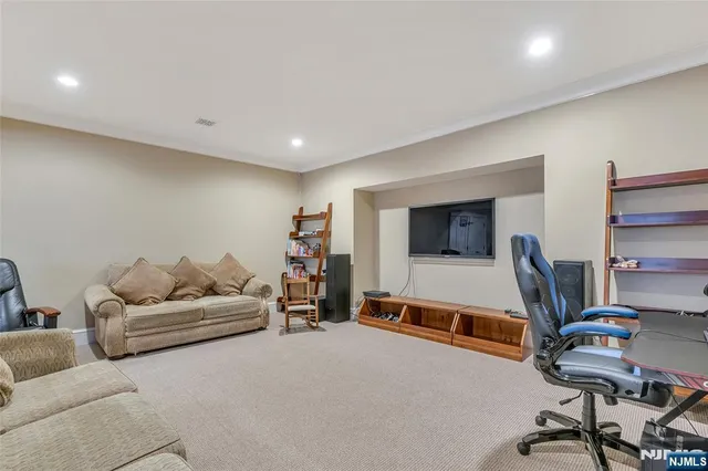 a living room with furniture and a couch