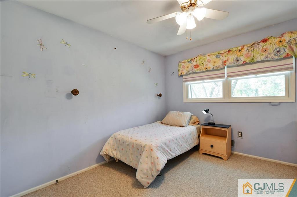 124 Fairfield Road Princeton, NJ 08540 - Photo 18 of 24 a bedroom with a bed and window