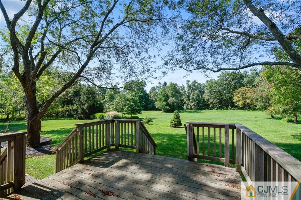 124 Fairfield Road Princeton, NJ 08540 - Photo 22 of 24 a view of a wooden deck with a big yard