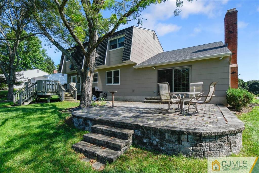 124 Fairfield Road Princeton, NJ 08540 - Photo 24 of 24 a view of a house with backyard tub and chairs