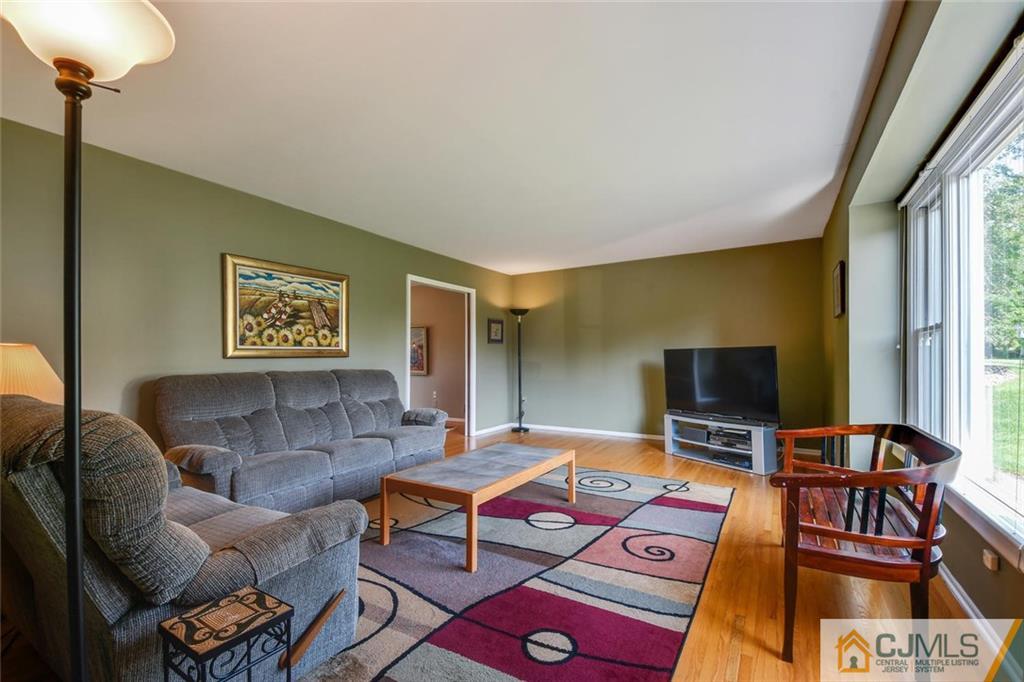 124 Fairfield Road Princeton, NJ 08540 - Photo 5 of 24 a living room with furniture and a flat screen tv