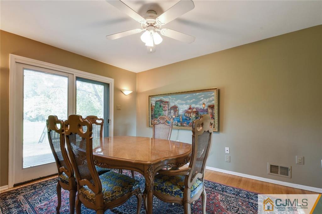 124 Fairfield Road Princeton, NJ 08540 - Photo 7 of 24 a view of a dining room with furniture and a large window