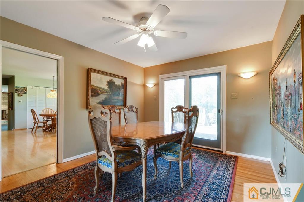 124 Fairfield Road Princeton, NJ 08540 - Photo 8 of 24 a view of a dining room with furniture and a chandelier