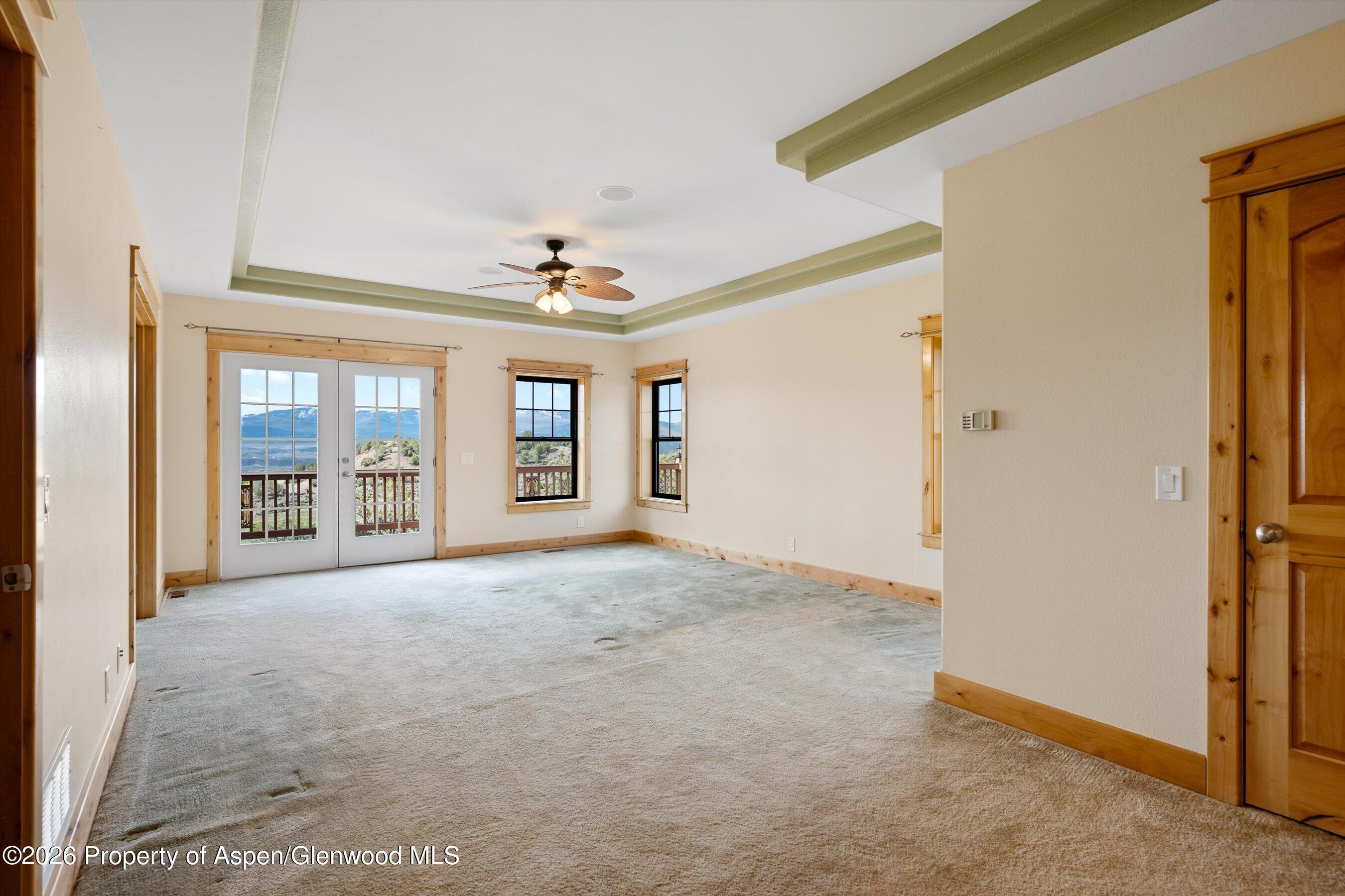 450 Summer Falls Road Silt, CO 81652 - Photo 14 of 50 a view of an empty room with a window