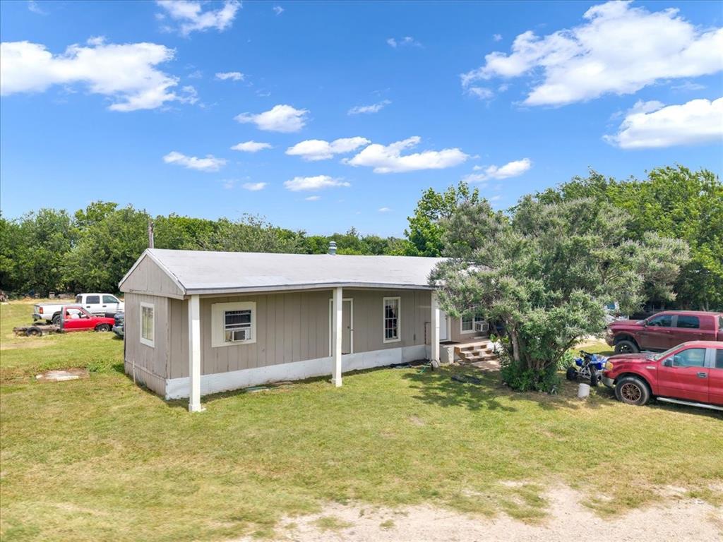 2511 Mathis Road Mansfield, TX 76063 - Photo 9 of 25 a view of a house with backyard and garden