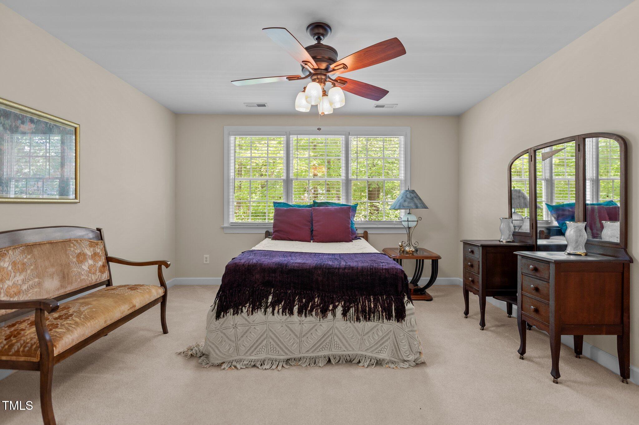 1224 Wedgeland Drive Raleigh, NC 27615 - Photo 25 of 36 a living room with furniture and a large window