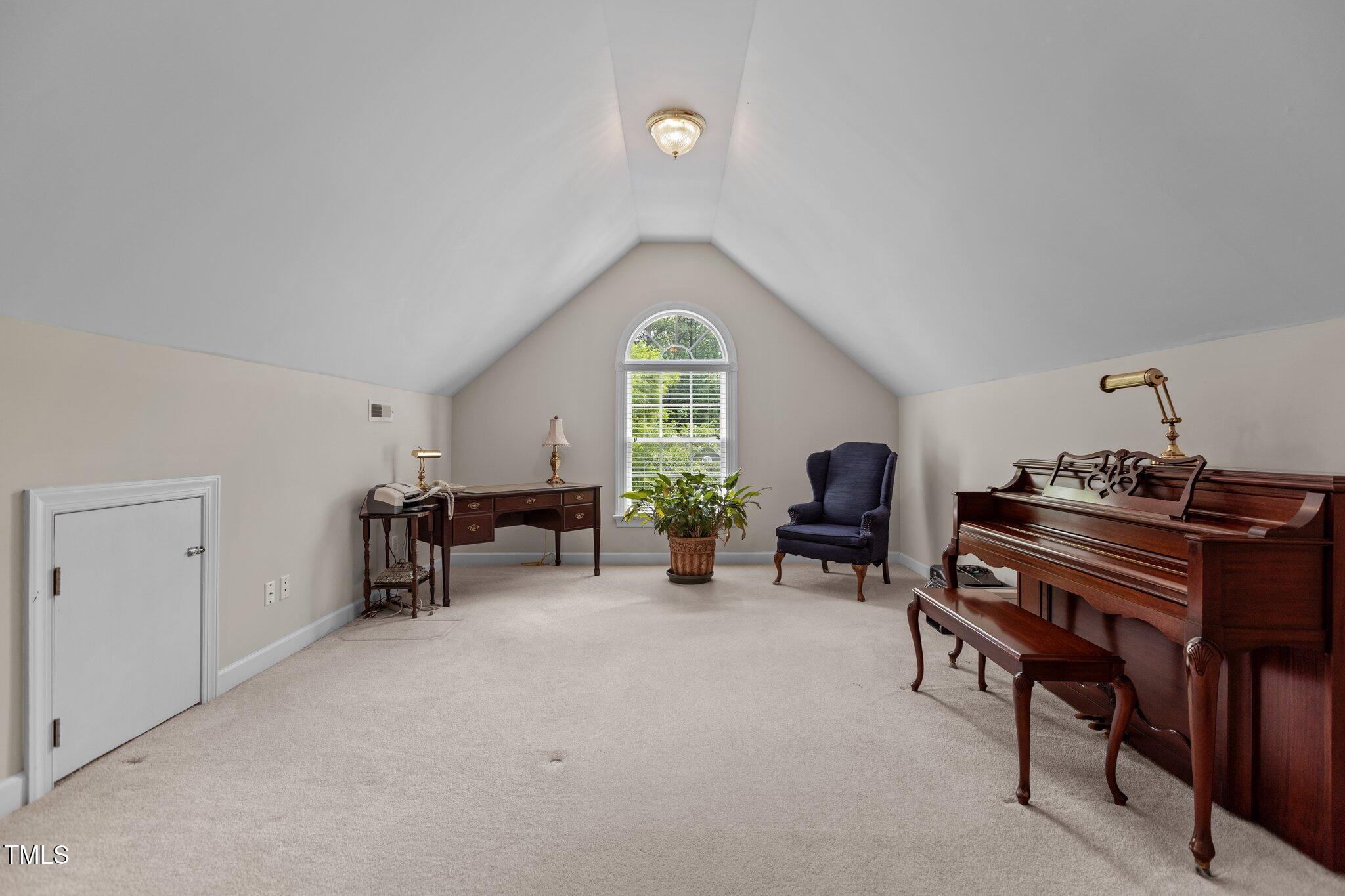 1224 Wedgeland Drive Raleigh, NC 27615 - Photo 27 of 36 a living room with furniture and a large window