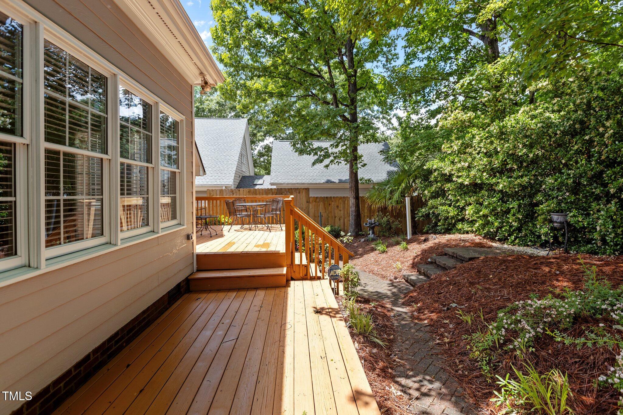 1224 Wedgeland Drive Raleigh, NC 27615 - Photo 32 of 36 a view of balcony with wooden floor and outdoor space