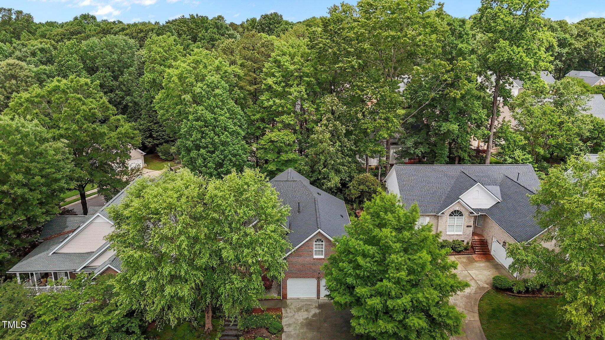 1224 Wedgeland Drive Raleigh, NC 27615 - Photo 34 of 36 an aerial view of a house with outdoor space and street view