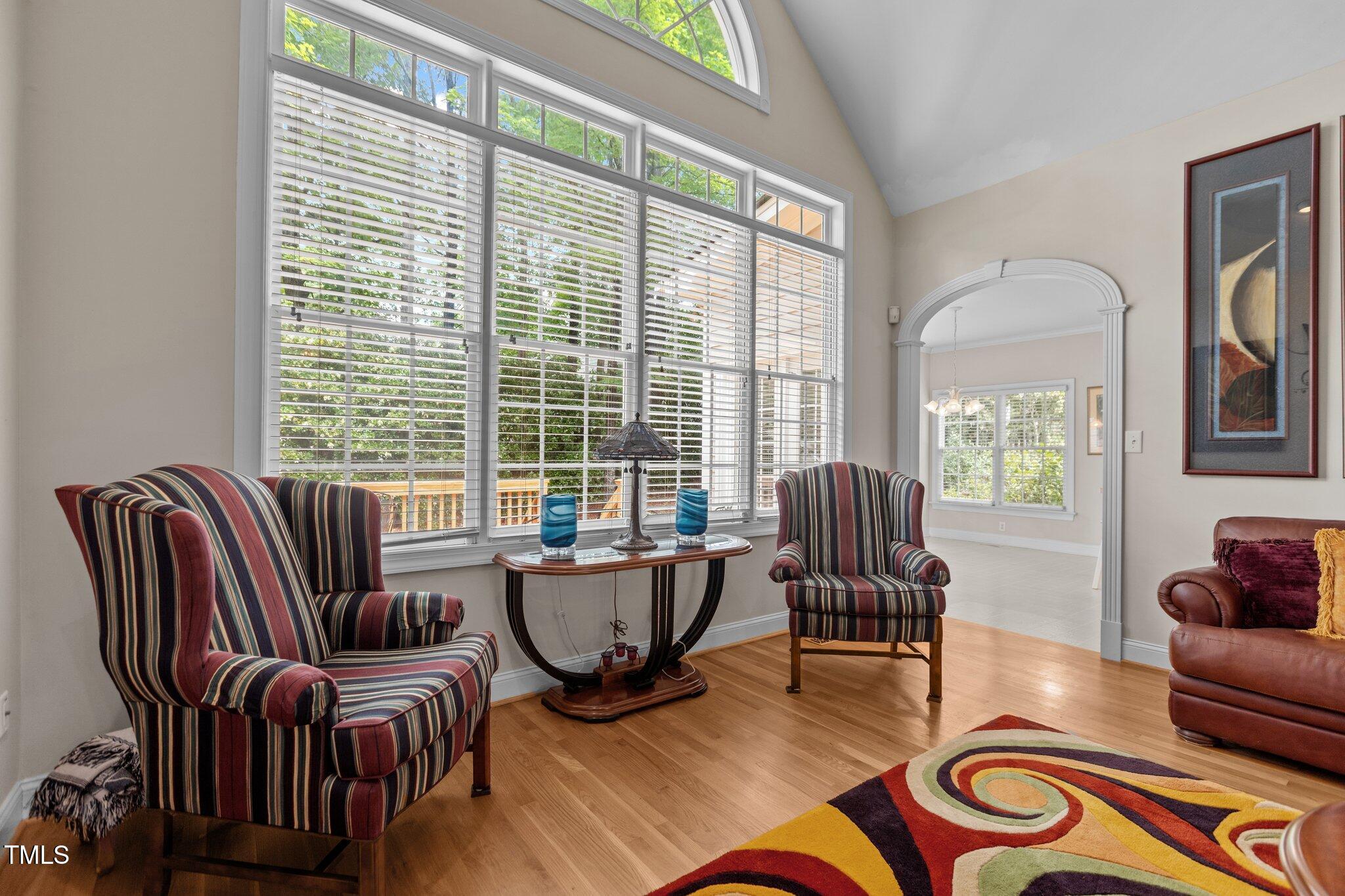 1224 Wedgeland Drive Raleigh, NC 27615 - Photo 10 of 36 a living room with furniture and a large window