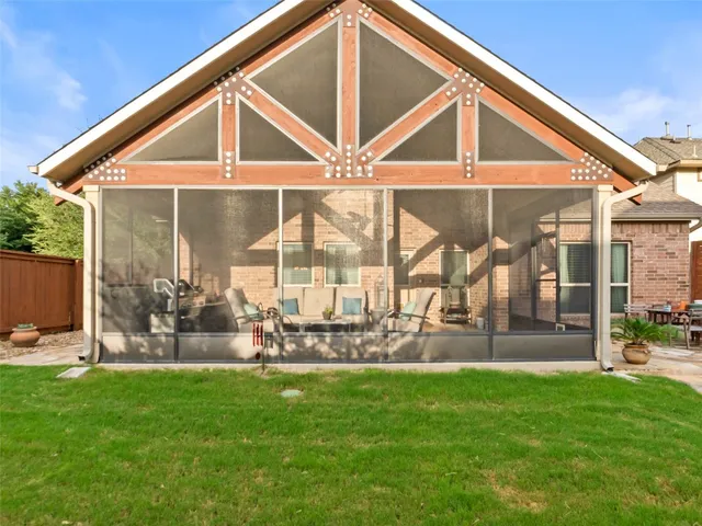 a view of backyard with seating space