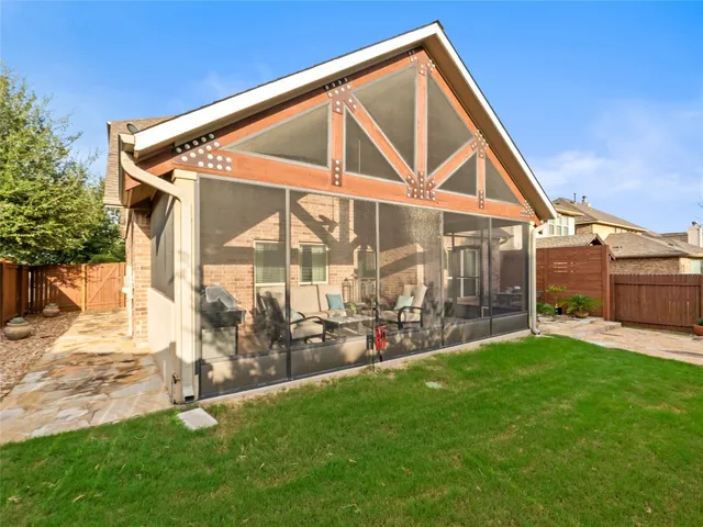 a view of yard with patio