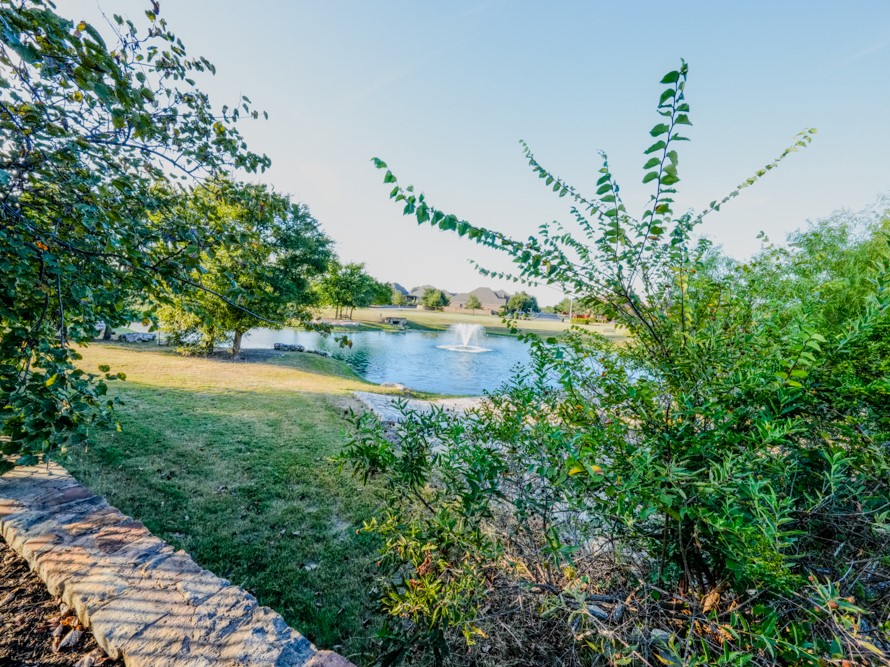 1101 Feather Reed Drive Leander, TX 78641 - Photo 39 of 40 a view of a lake with a yard