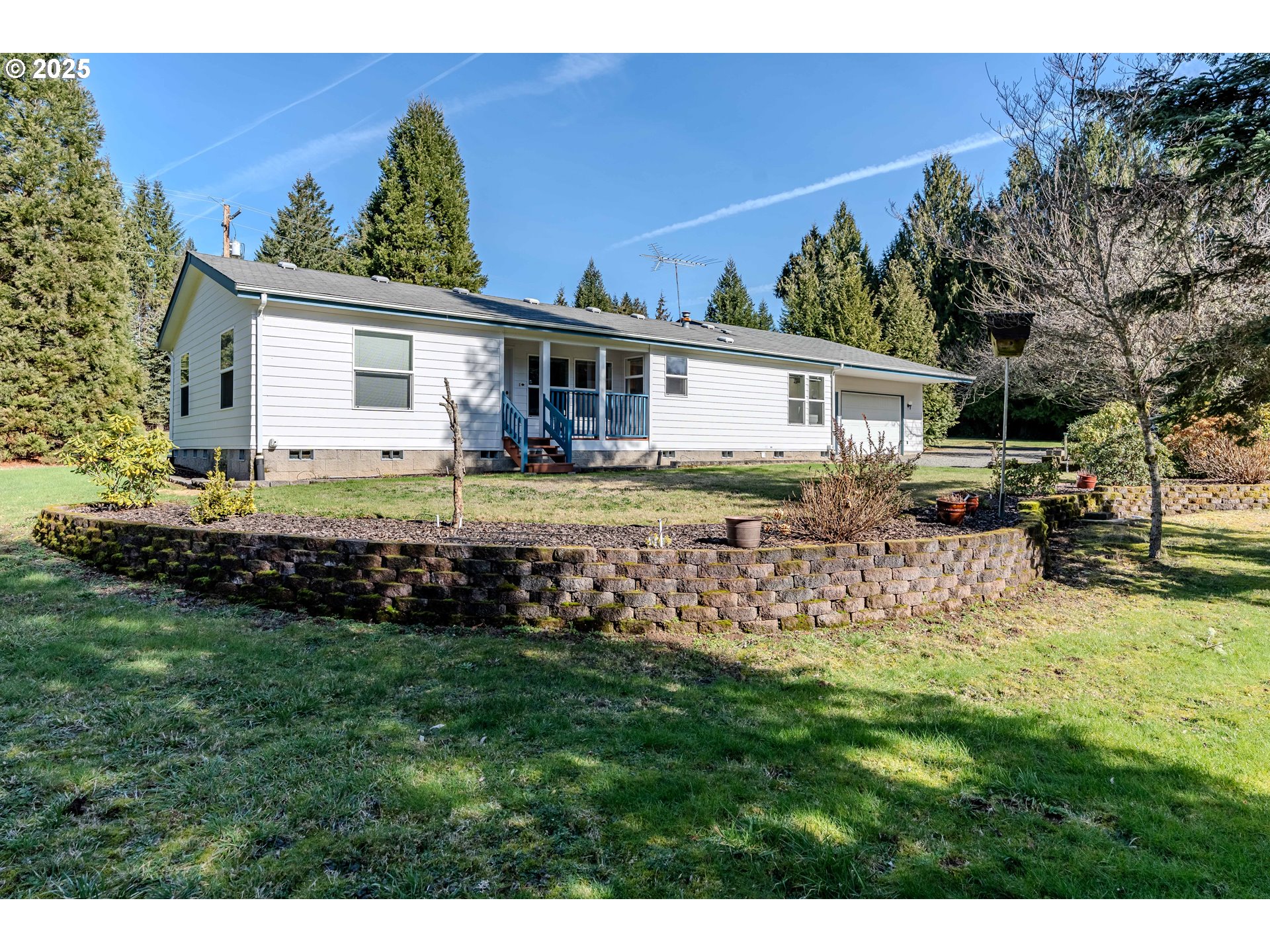 41300 Southeast Louden Road Corbett, OR 97019 - Photo 1 of 48 a house view with a garden space