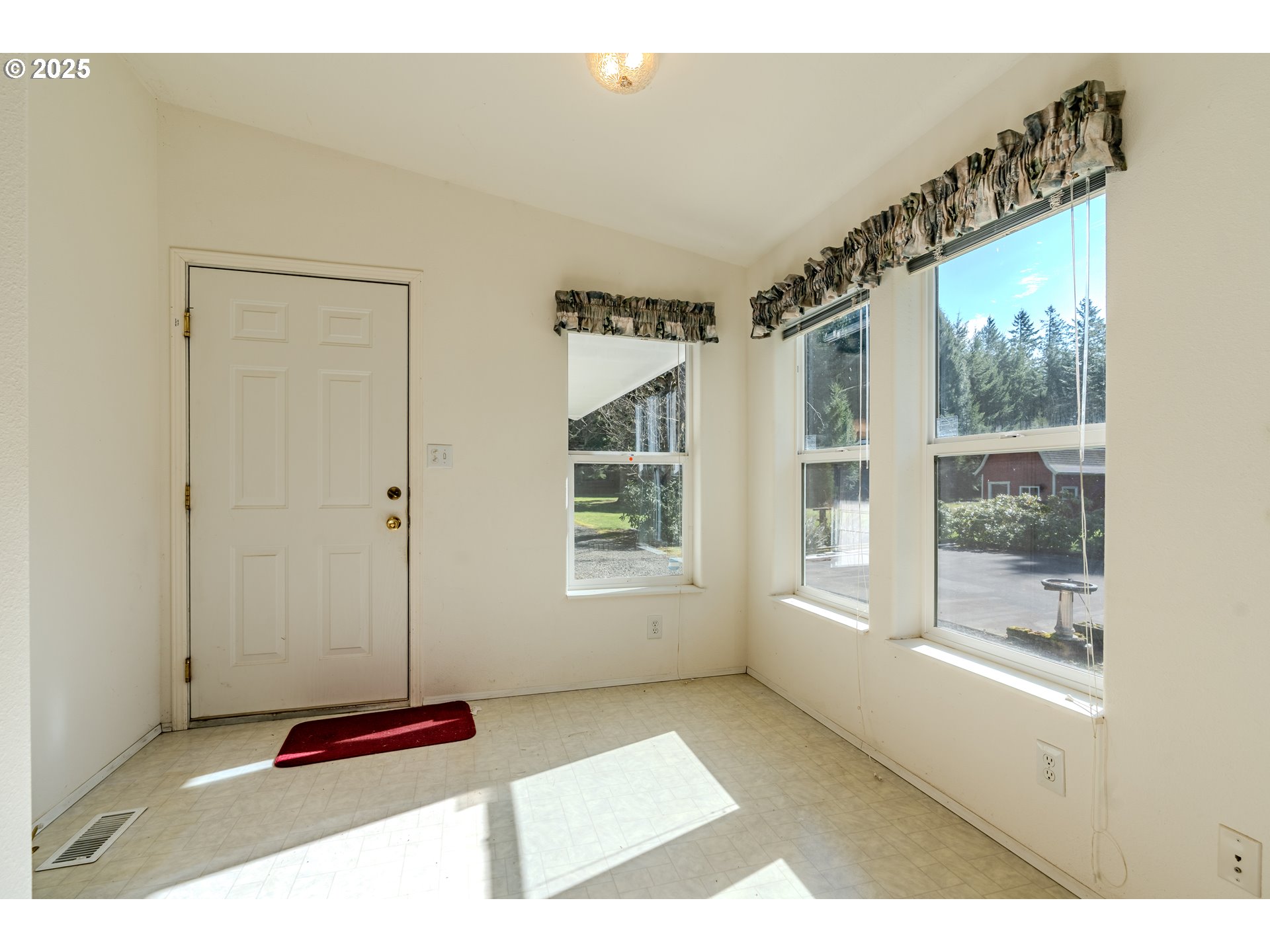 41300 Southeast Louden Road Corbett, OR 97019 - Photo 16 of 48 a living room with furniture and a large window