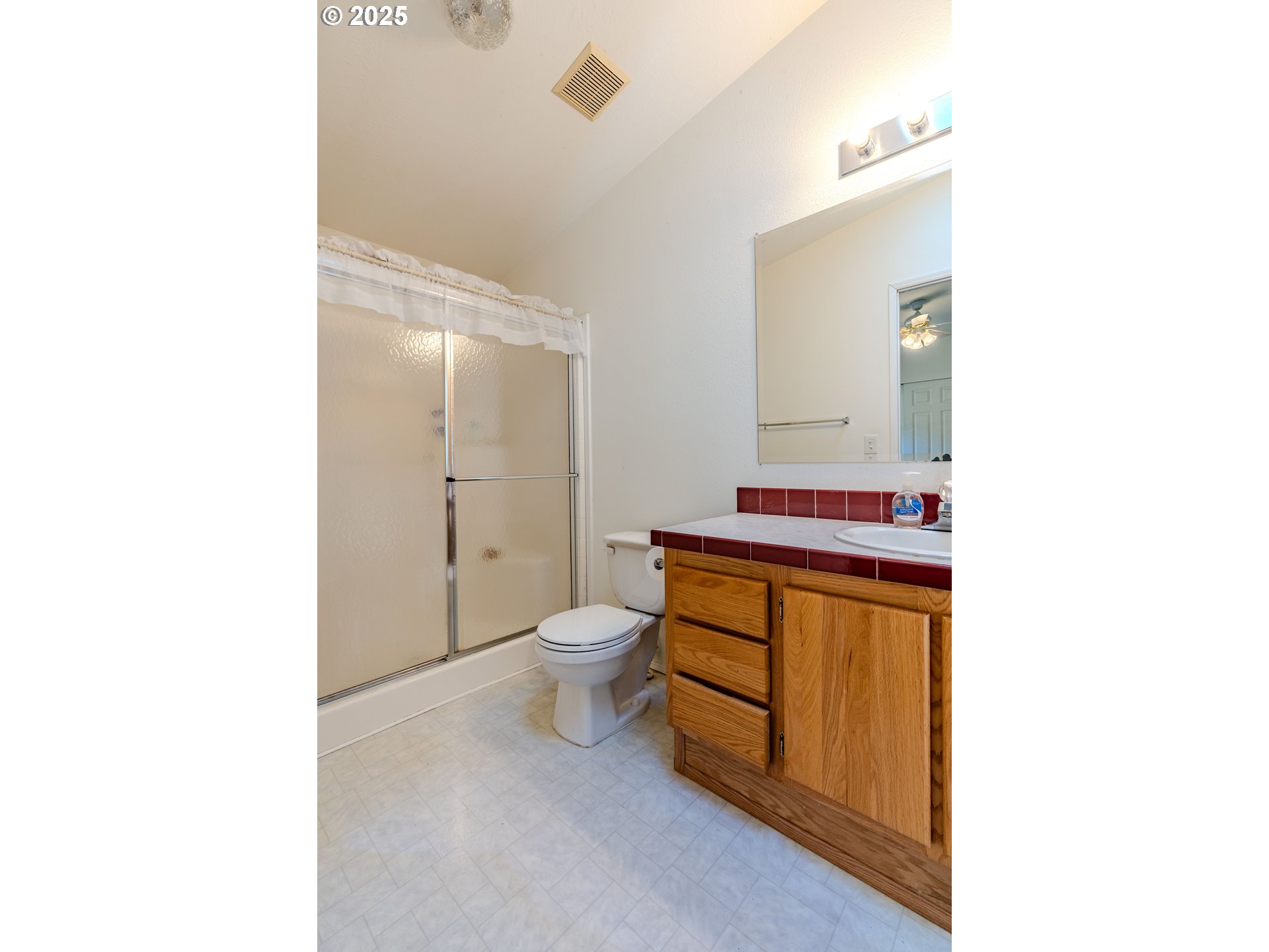 41300 Southeast Louden Road Corbett, OR 97019 - Photo 20 of 48 a bathroom with a sink and a mirror