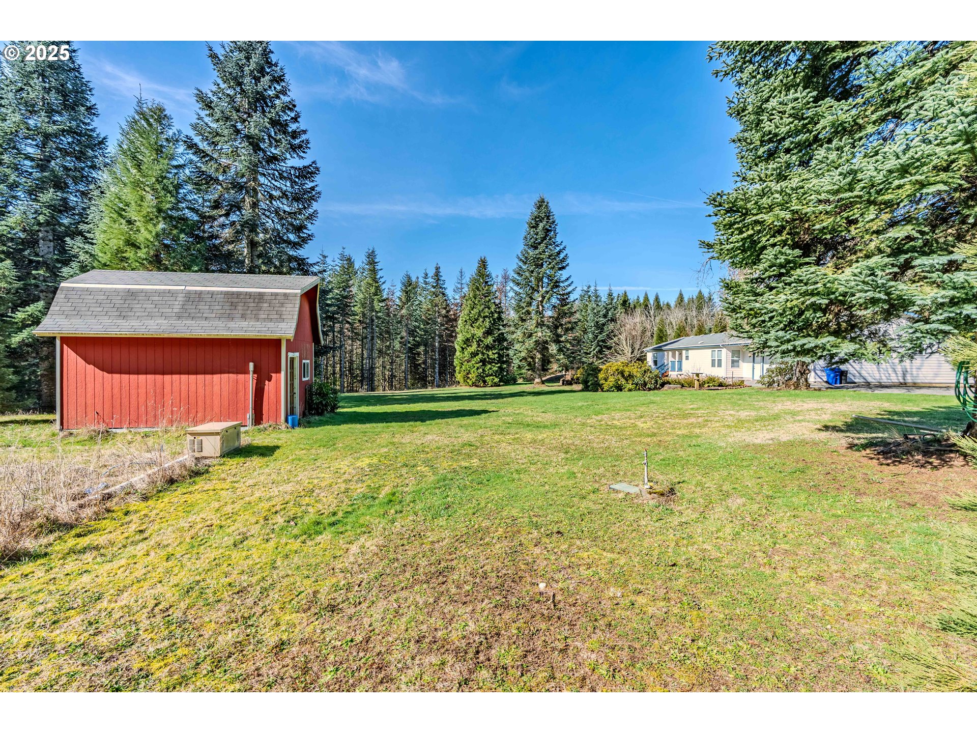 41300 Southeast Louden Road Corbett, OR 97019 - Photo 31 of 48 a backyard of a house with lots of green space