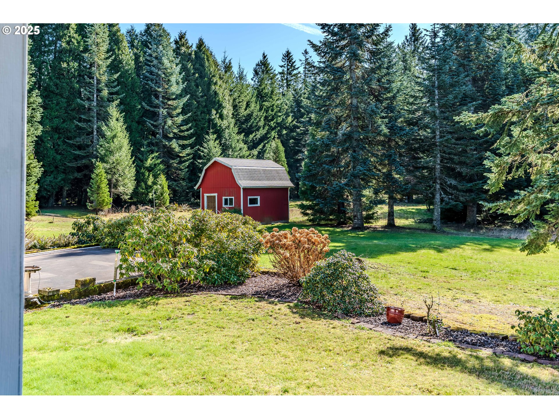 41300 Southeast Louden Road Corbett, OR 97019 - Photo 34 of 48 a view of a garden with a house