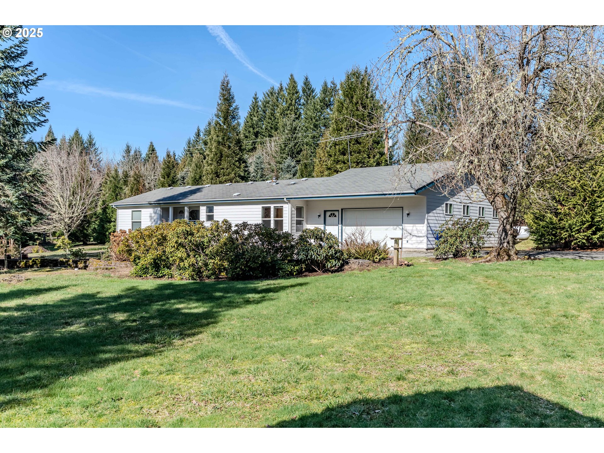 41300 Southeast Louden Road Corbett, OR 97019 - Photo 37 of 48 a house view with a garden space