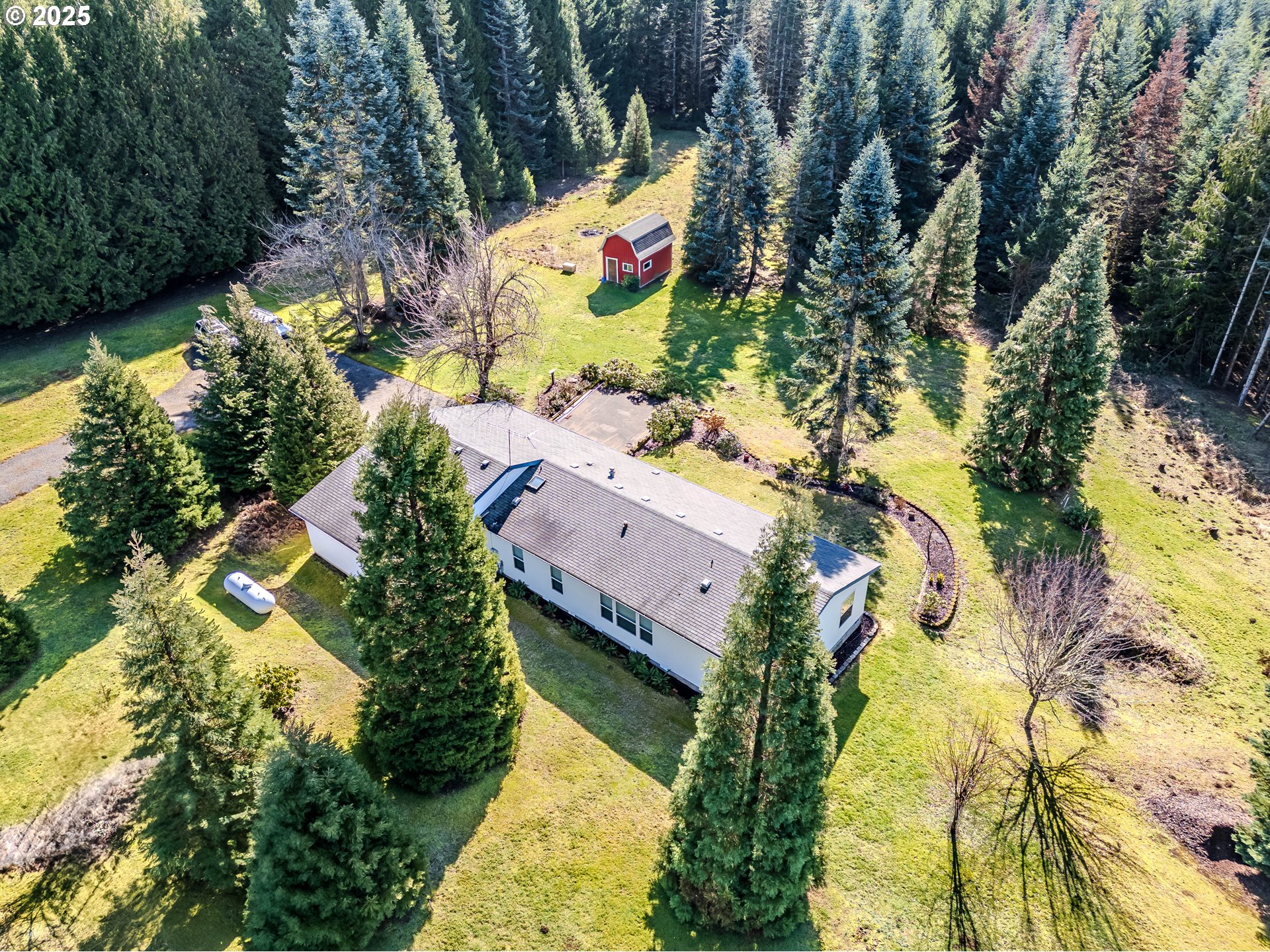 41300 Southeast Louden Road Corbett, OR 97019 - Photo 4 of 48 an aerial view of a house with a yard and garden