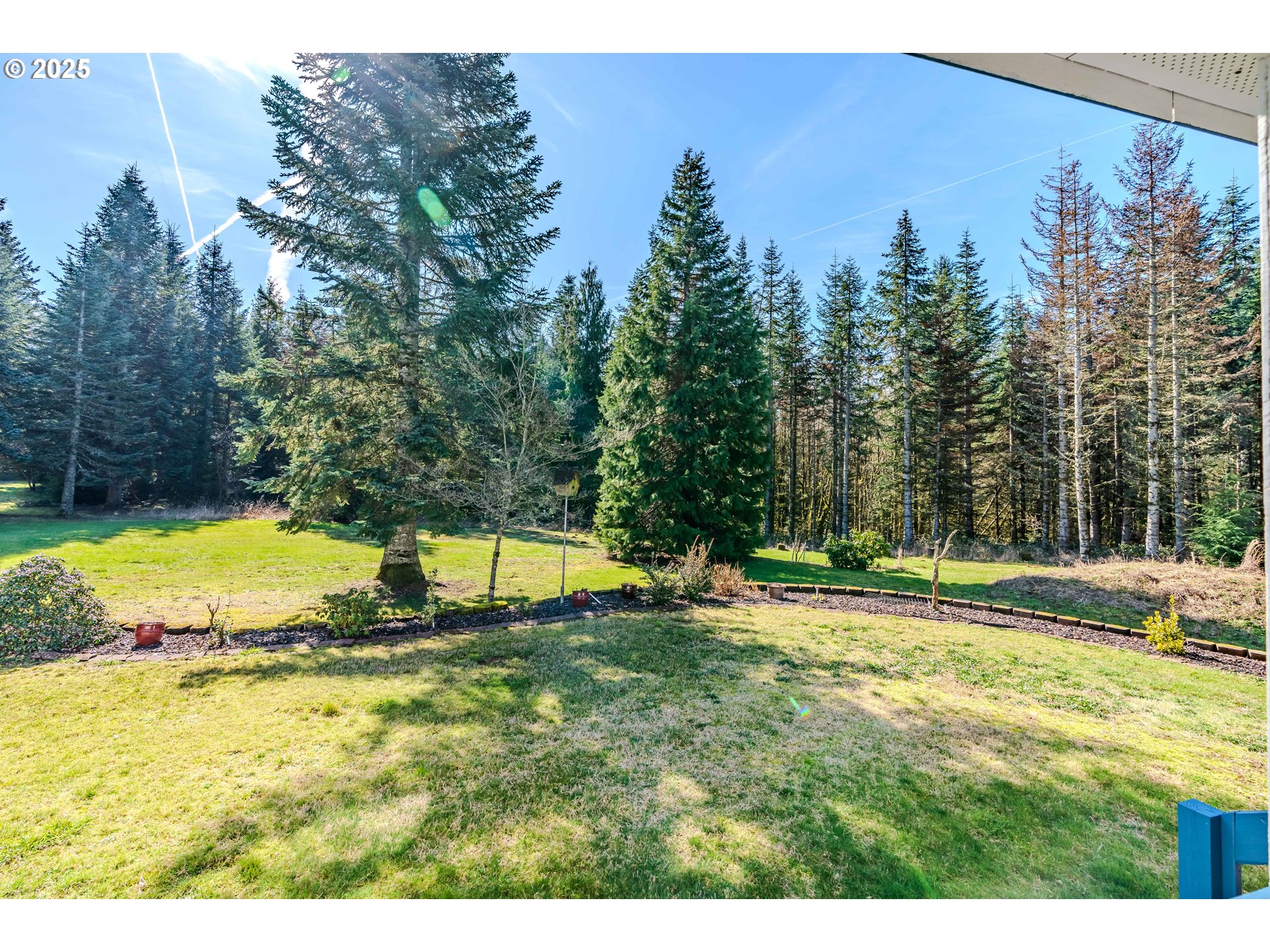 41300 Southeast Louden Road Corbett, OR 97019 - Photo 41 of 48 a view of a swimming pool with an outdoor space and seating area