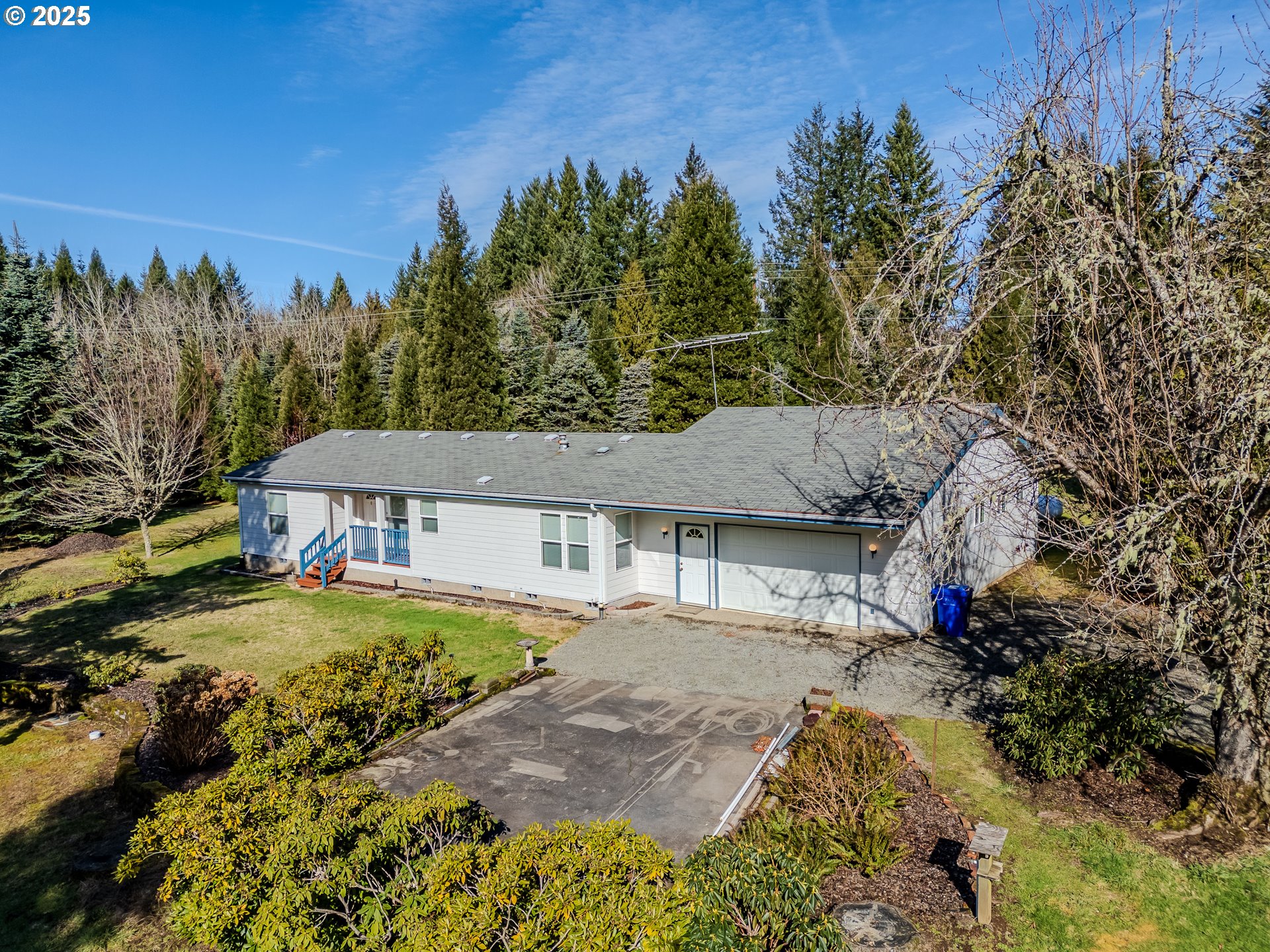 41300 Southeast Louden Road Corbett, OR 97019 - Photo 5 of 48 a view of a house with a yard and sitting area