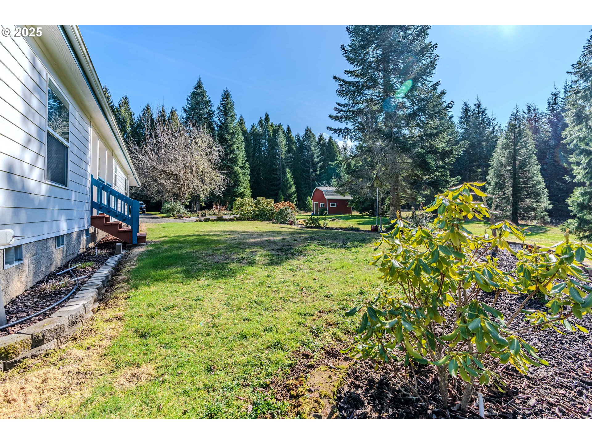 41300 Southeast Louden Road Corbett, OR 97019 - Photo 9 of 48 a view of a house with a yard and sitting area