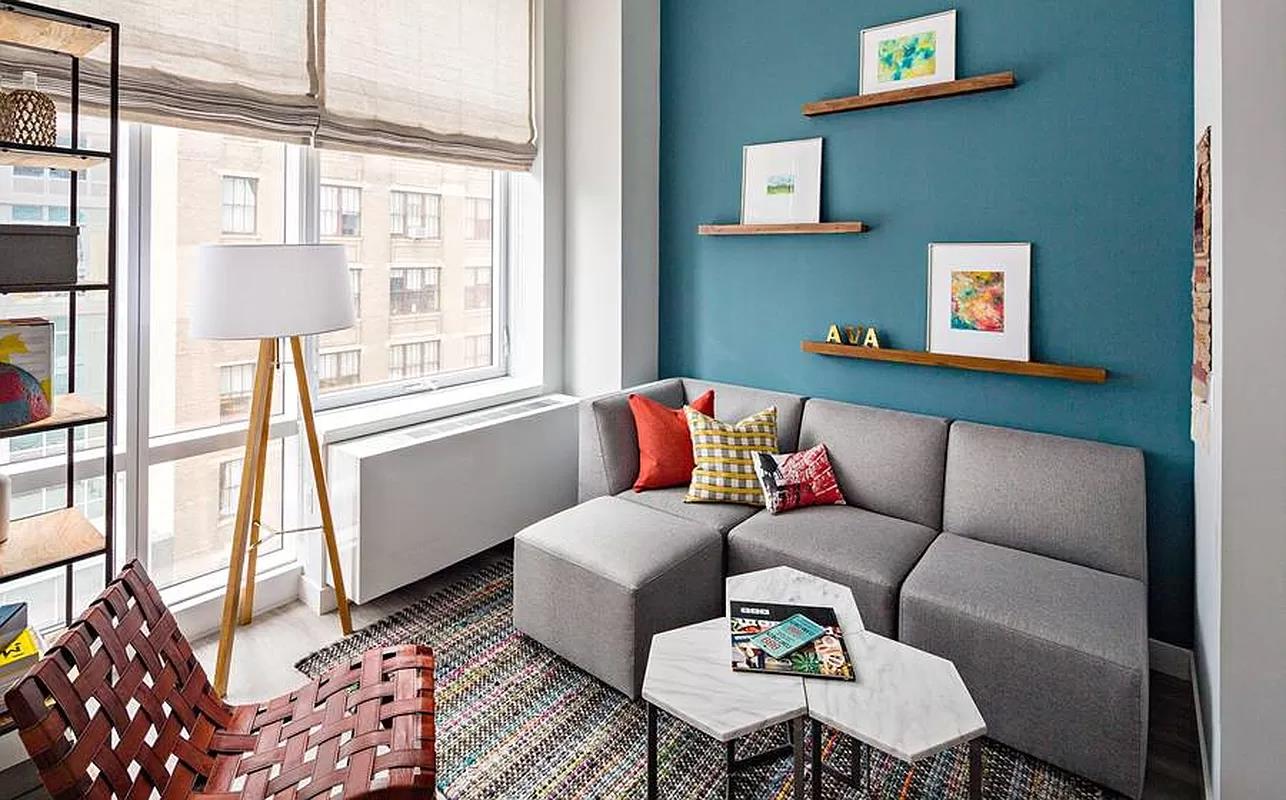 100 Willoughby Street, Unit 28Q Brooklyn, NY 11201 - Photo 2 of 10 a living room with furniture and a window