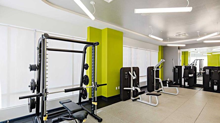 100 Willoughby Street, Unit 28Q Brooklyn, NY 11201 - Photo 6 of 10 a view of a room with gym equipment