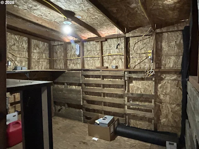 a view of a garage with a lot of stuff