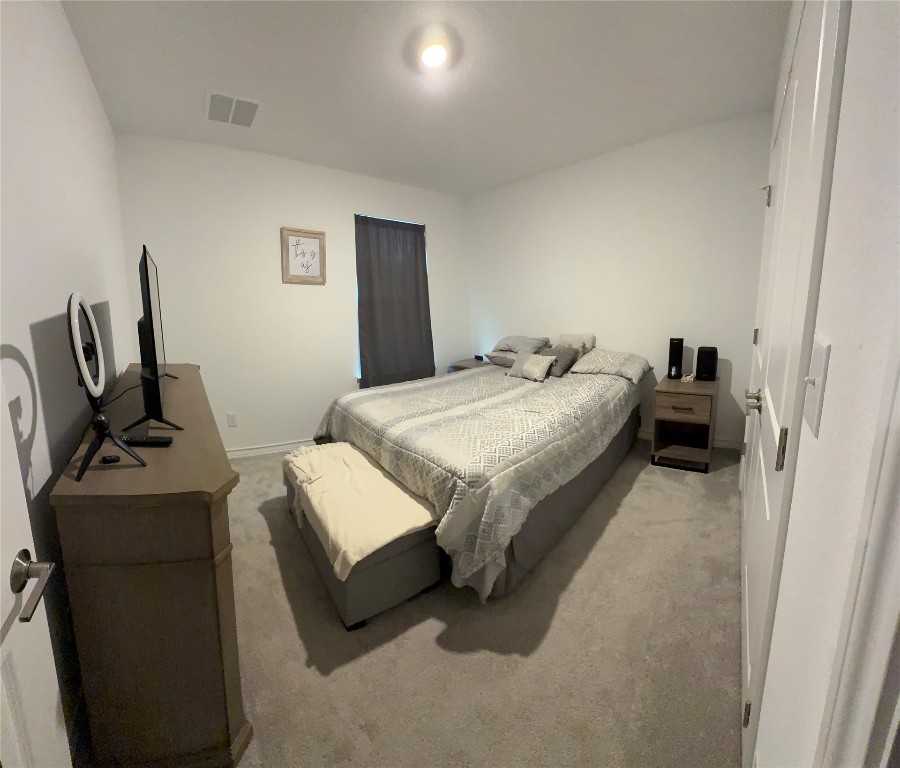 497 Papaya Drive Buda, TX 78610 - Photo 30 of 39 Large bedroom #3 with room for a queen or king size bed