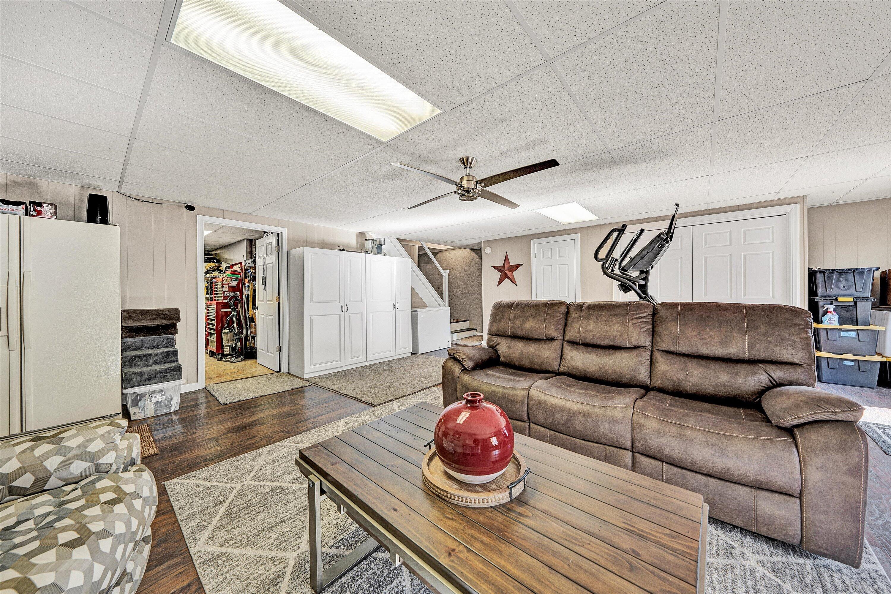 1160 Sandy Level Road Goodview, VA 24095 - Photo 19 of 47 a living room with furniture and a wooden floor