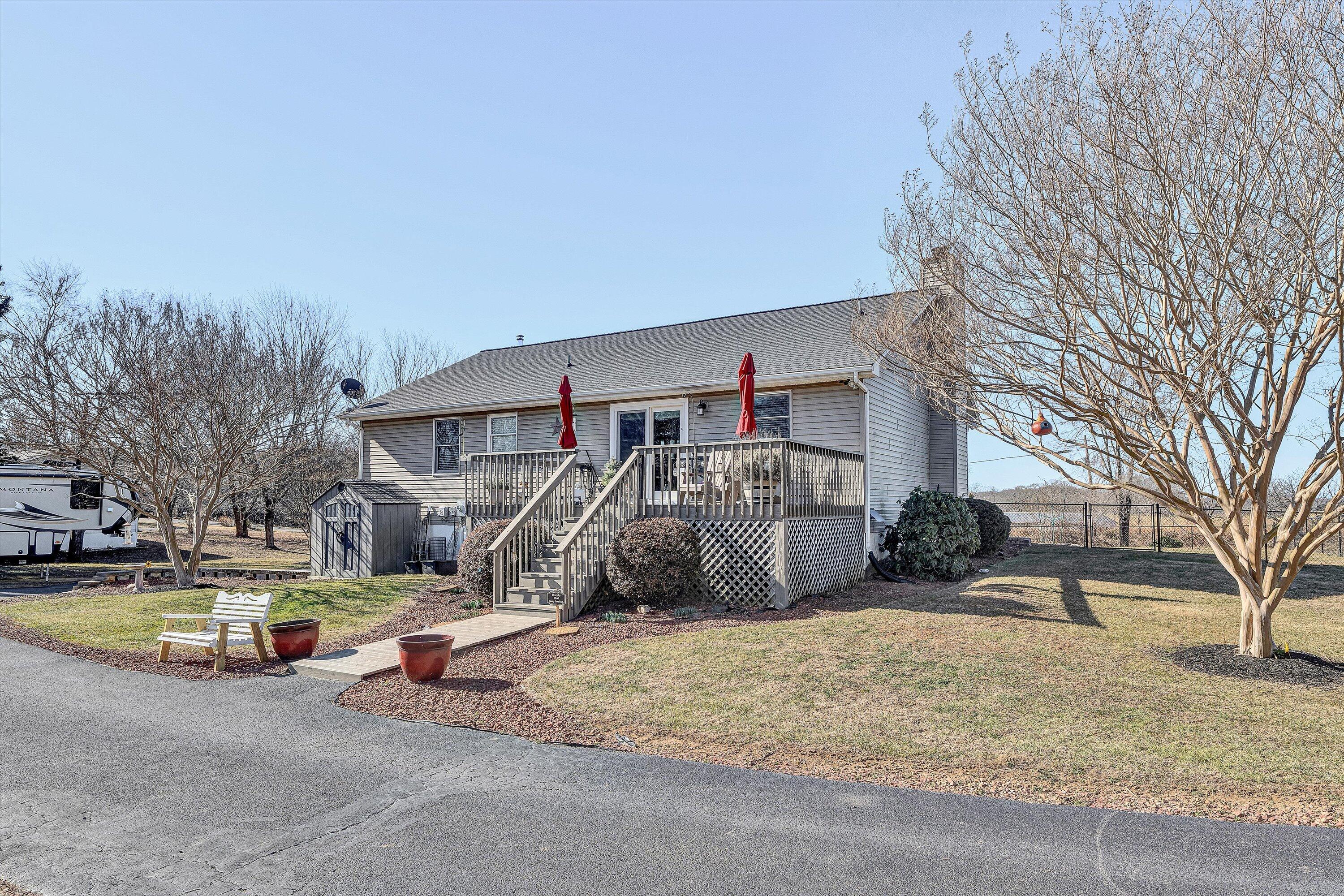 1160 Sandy Level Road Goodview, VA 24095 - Photo 29 of 47 a view of a house with a yard