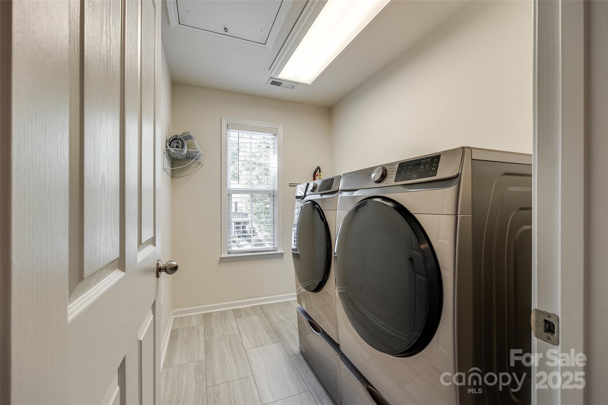 714 Deerbrook Lane Tega Cay, SC 29708 - Photo 24 of 35 a utility room with dryer and washer