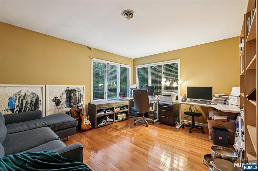 47 Matthew Road Wayne, NJ 07470 - Photo 12 of 25 a view of a livingroom with workspace and a window