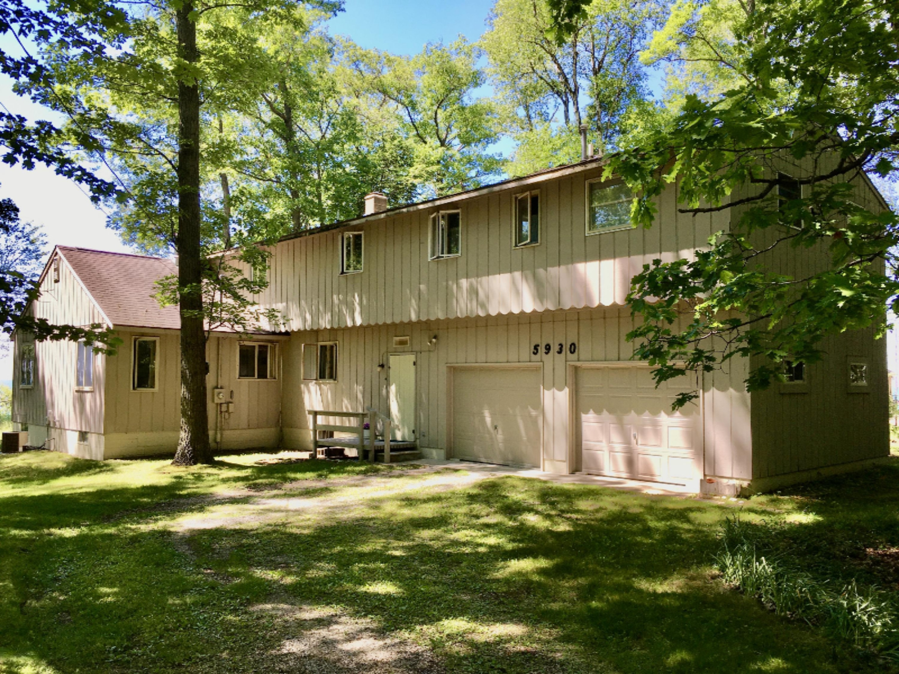 5930 Lakeshore Road Manistee, MI 49660 - Photo 2 of 101 2851B038-2406-4EBF-A4DF-8A7845459B37_1_2