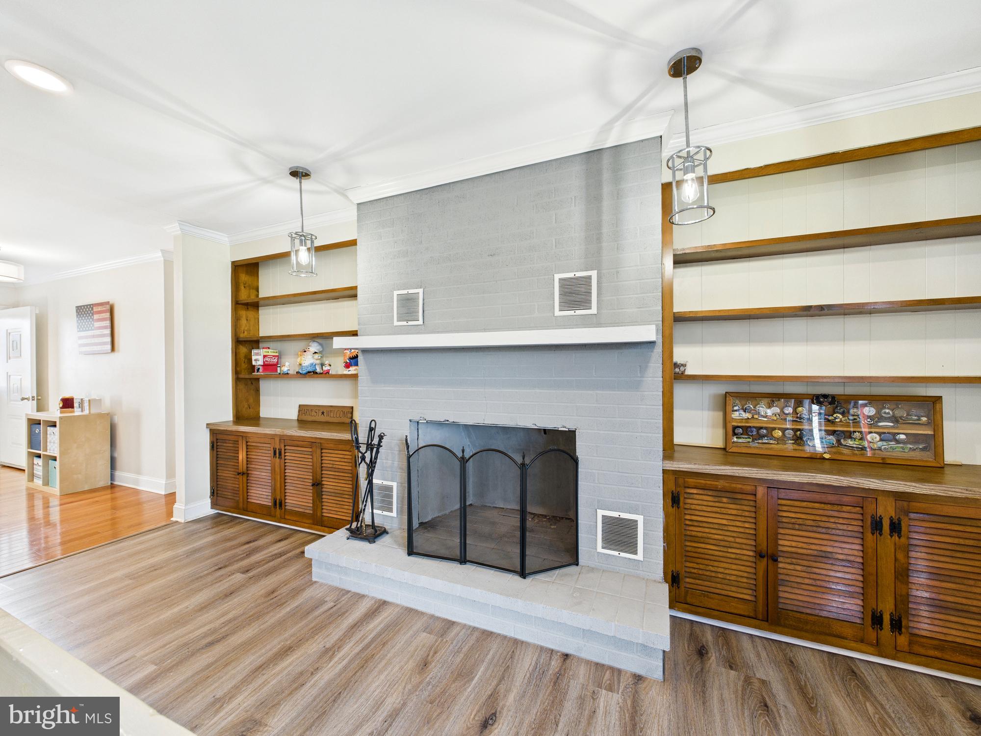 28964 Waller Road Delmar, MD 21875 - Photo 11 of 44 a living room with furniture and a fireplace