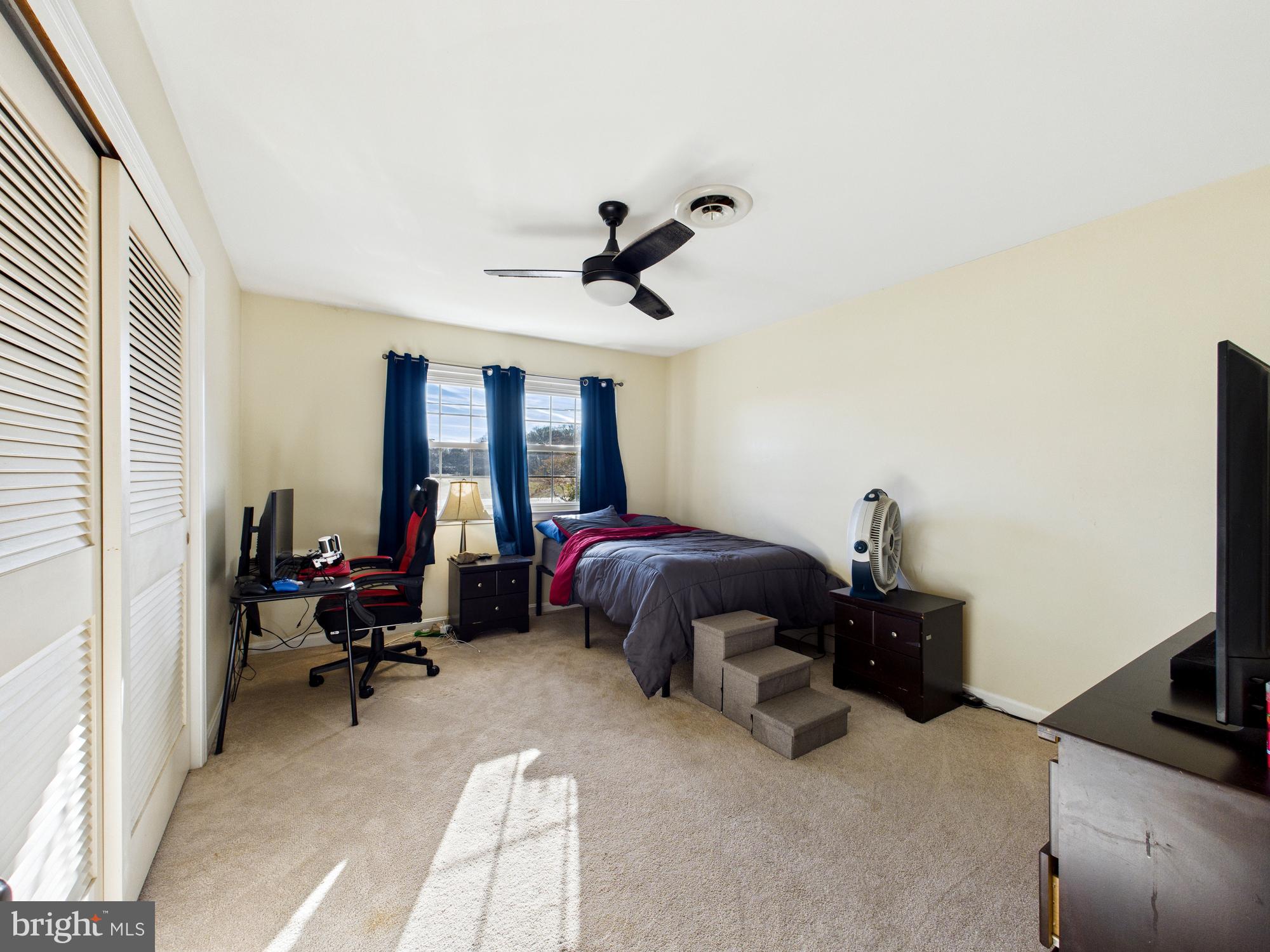 28964 Waller Road Delmar, MD 21875 - Photo 19 of 44 a bedroom with furniture and a window