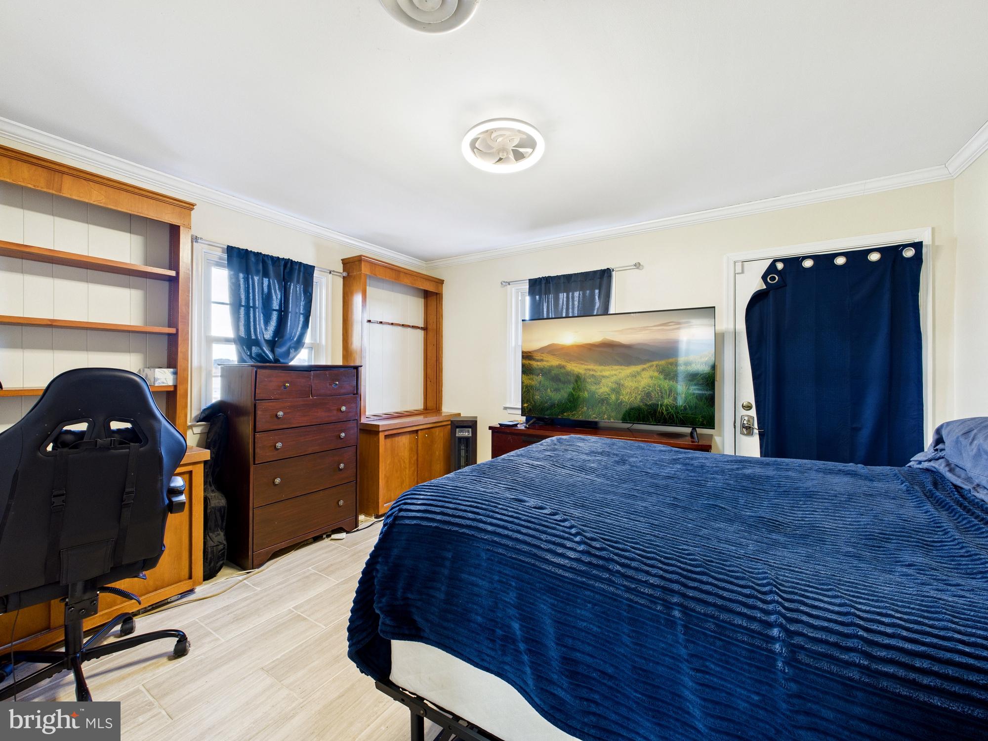 28964 Waller Road Delmar, MD 21875 - Photo 24 of 44 a bedroom with a bed and dresser