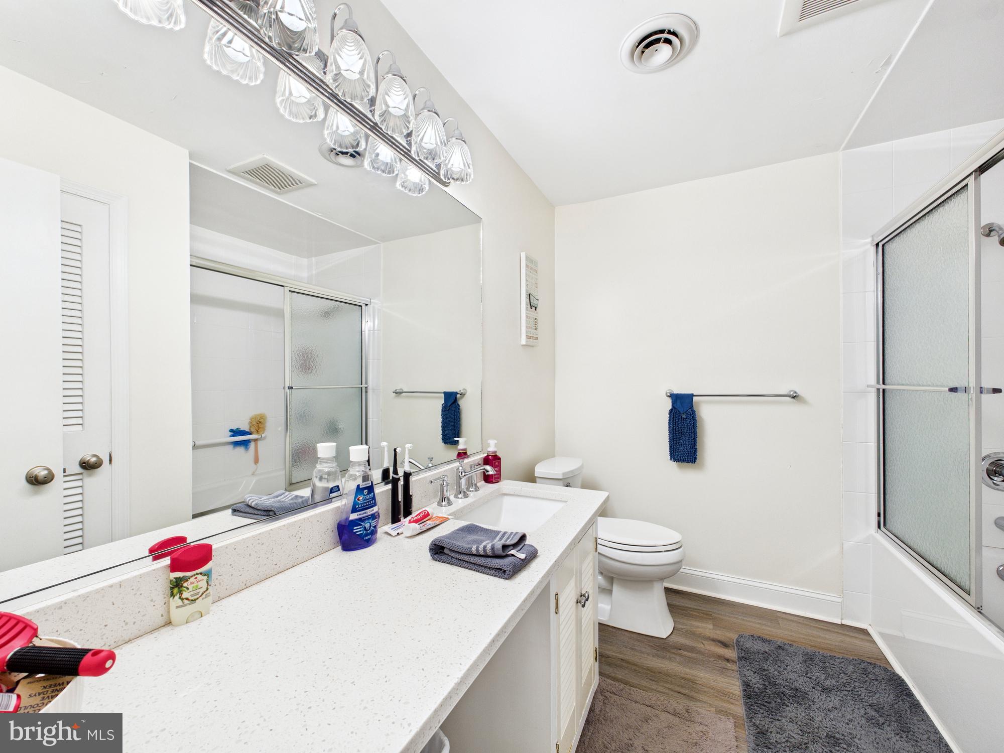 28964 Waller Road Delmar, MD 21875 - Photo 26 of 44 a bathroom with a sink vanity mirror and toilet