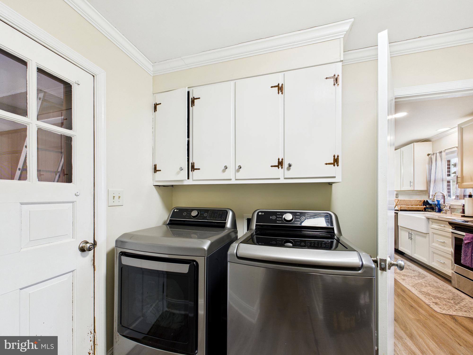 28964 Waller Road Delmar, MD 21875 - Photo 27 of 44 a kitchen with a stove and a cabinets