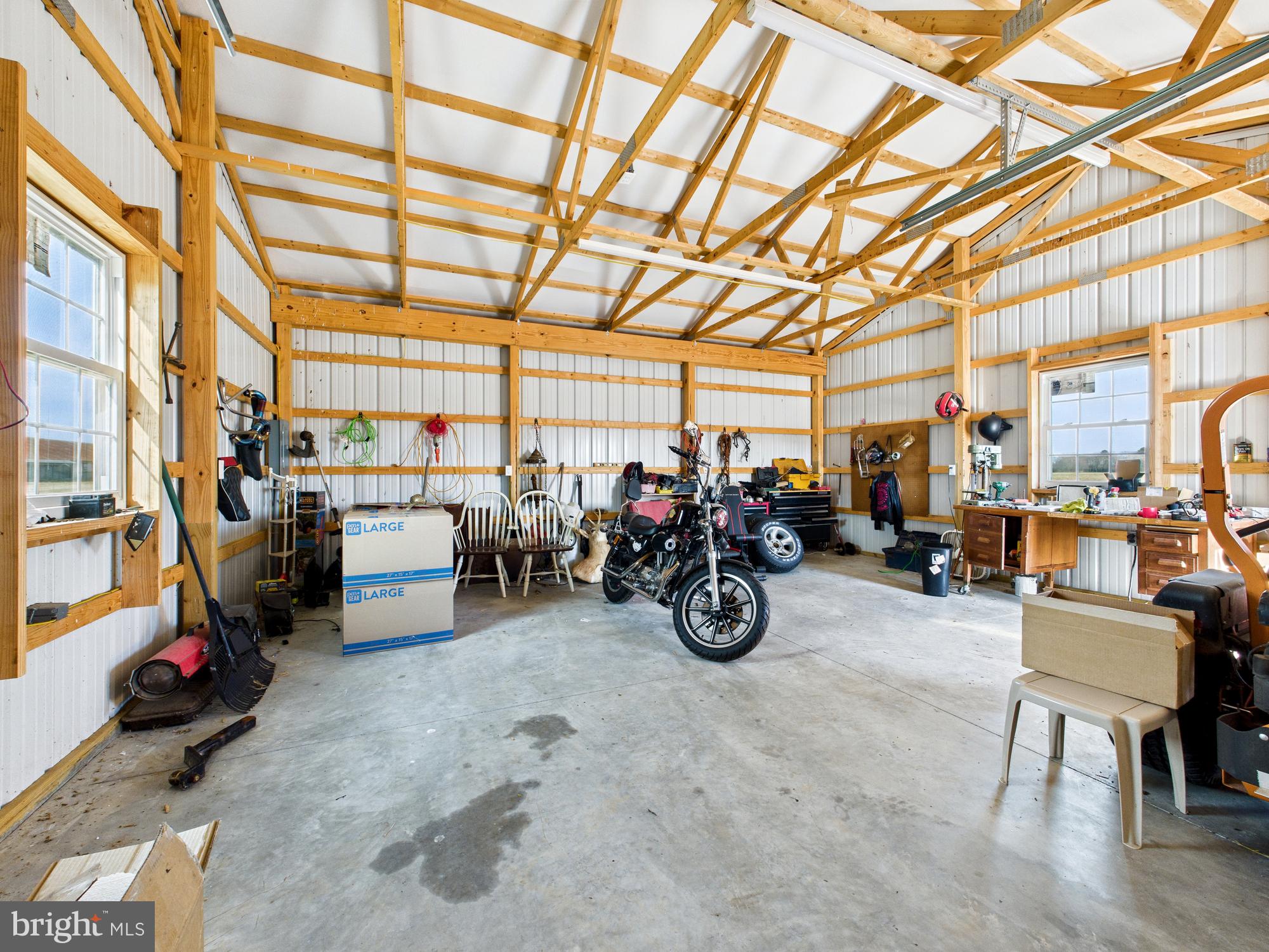 28964 Waller Road Delmar, MD 21875 - Photo 33 of 44 a view of a garage with a lot of stuff