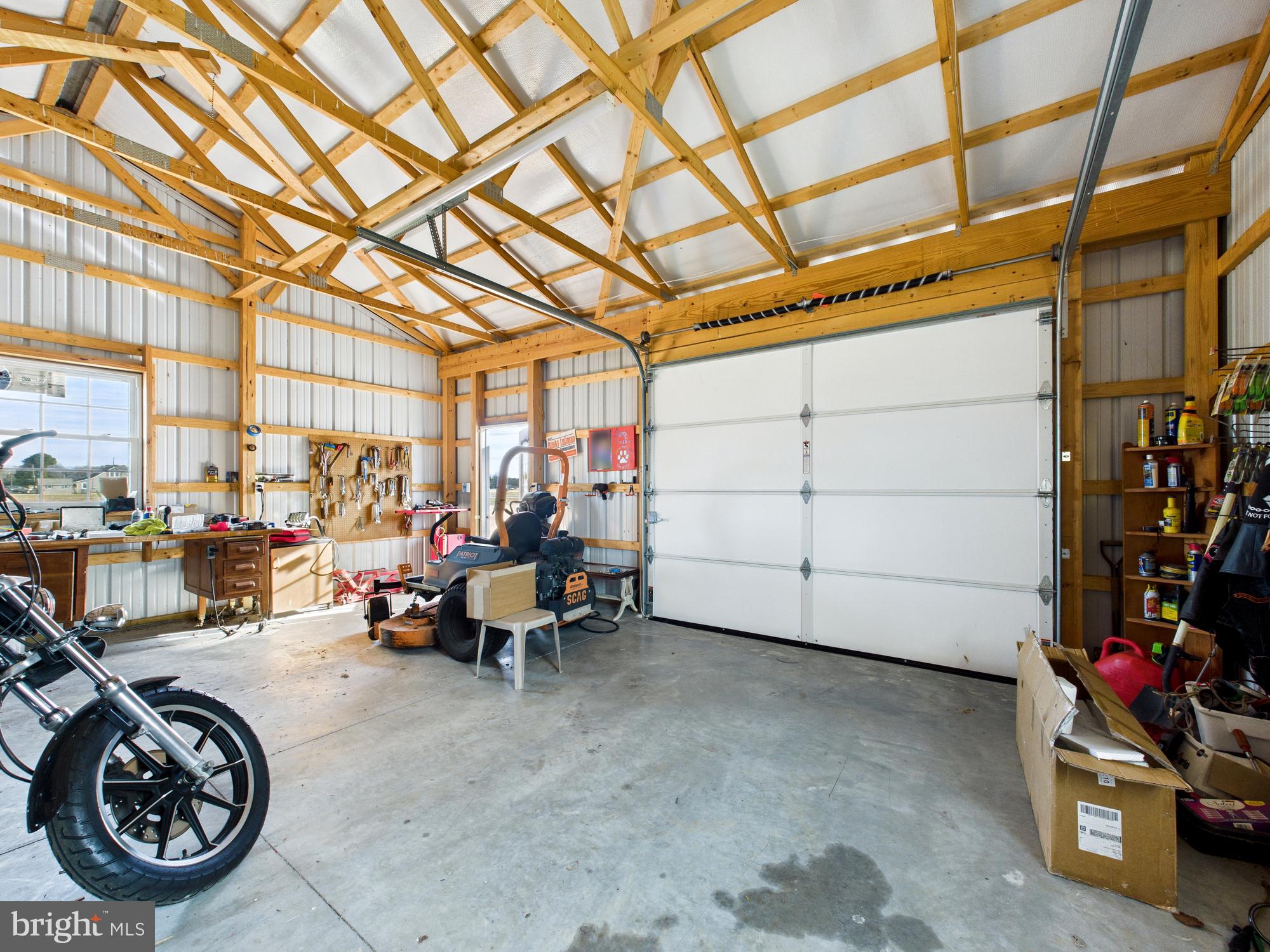 28964 Waller Road Delmar, MD 21875 - Photo 34 of 44 a view of a garage with parked cars