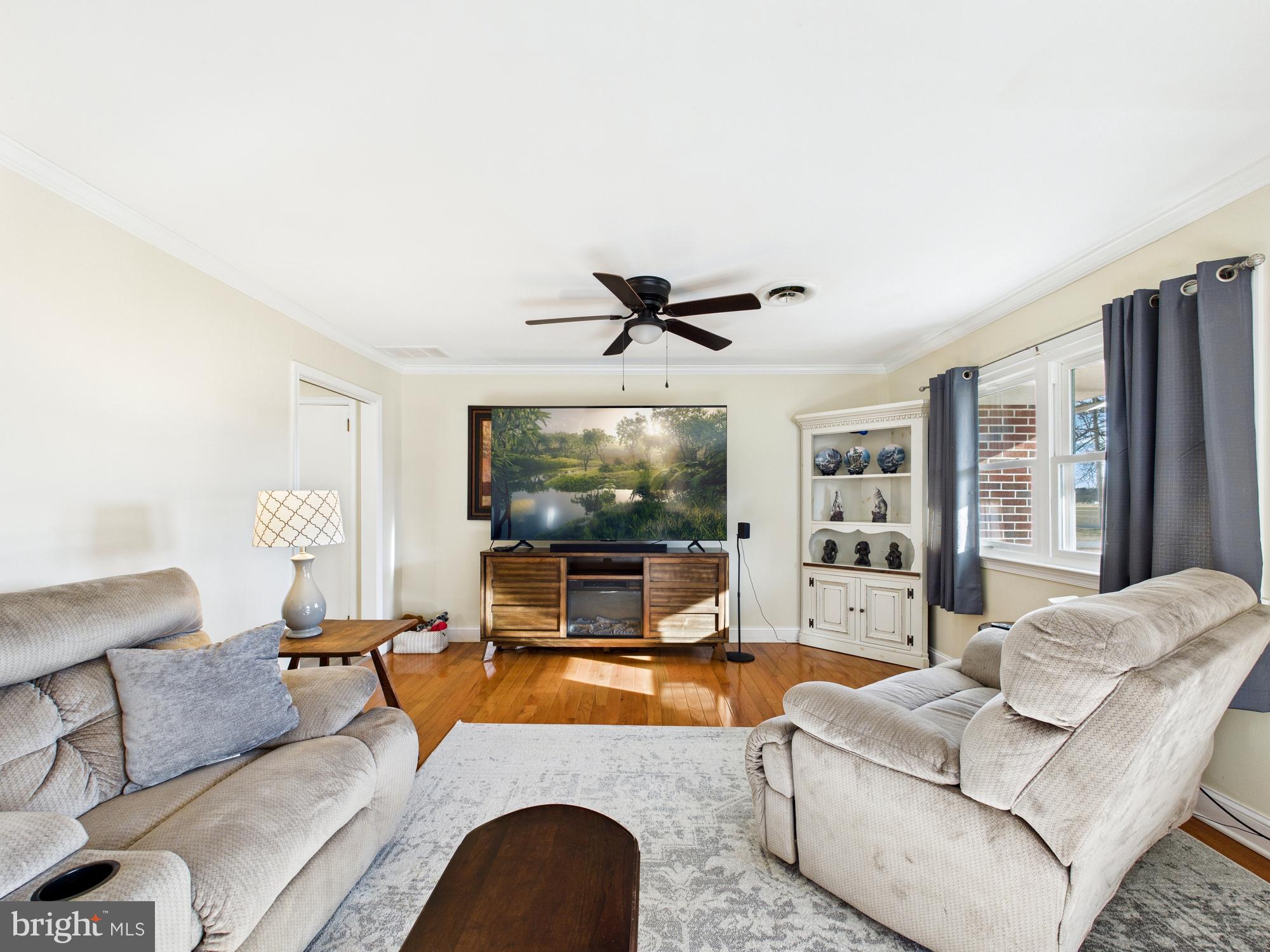28964 Waller Road Delmar, MD 21875 - Photo 5 of 44 a living room with furniture and a large window
