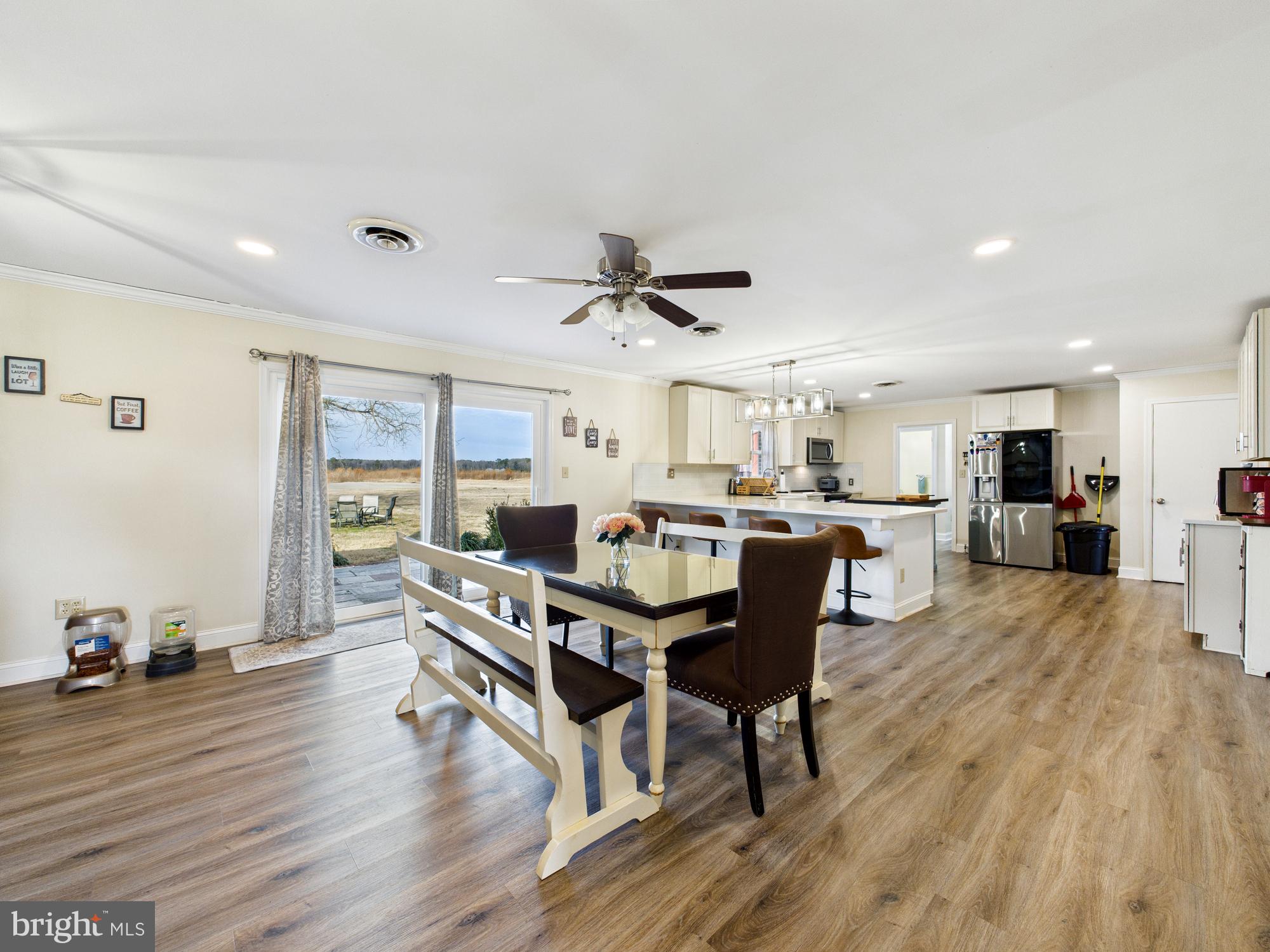 28964 Waller Road Delmar, MD 21875 - Photo 7 of 44 a living room with furniture and a wooden floor