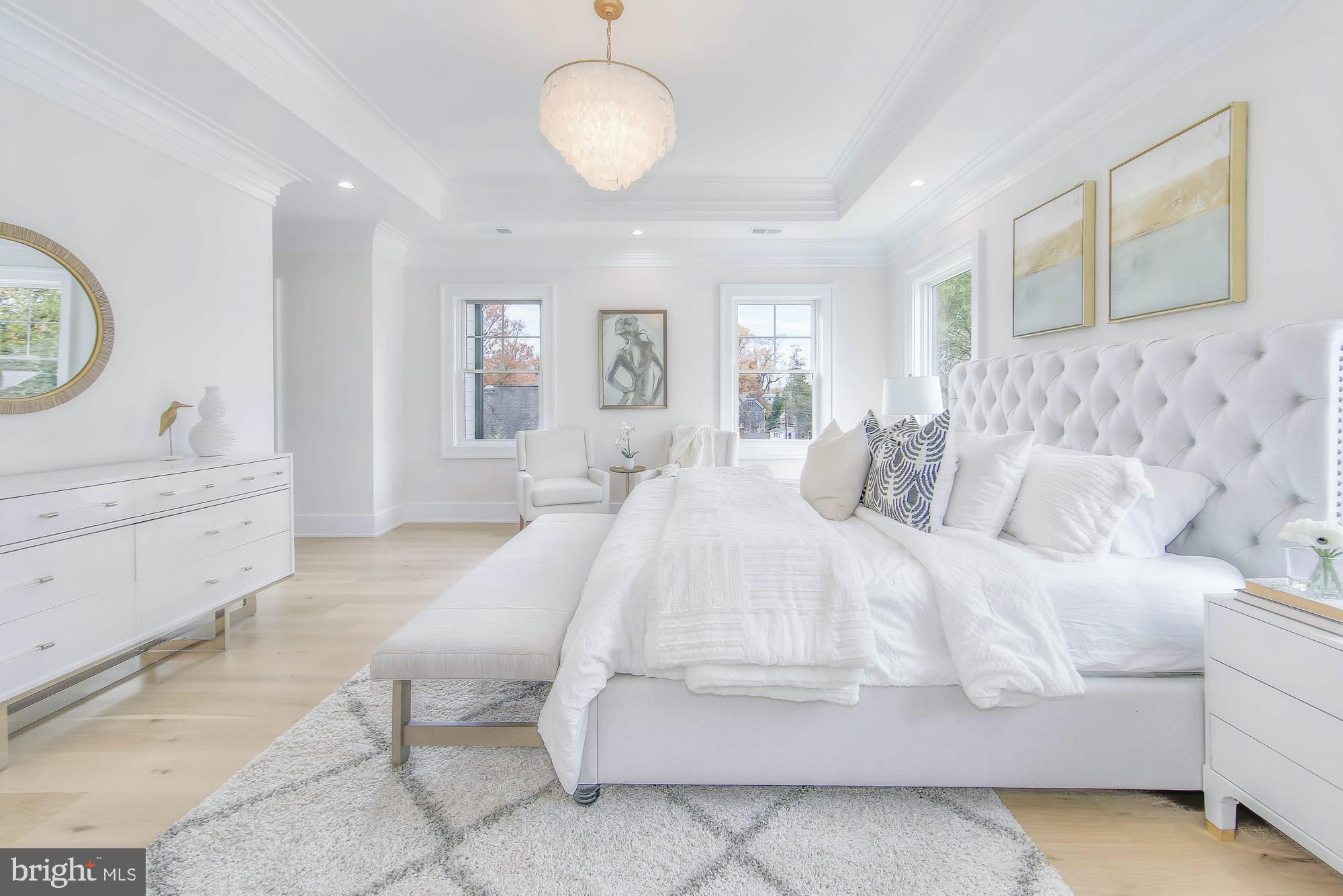 6012 Sonoma Road Bethesda, MD 20817 - Photo 22 of 57 a spacious bedroom with a bed and a dresser