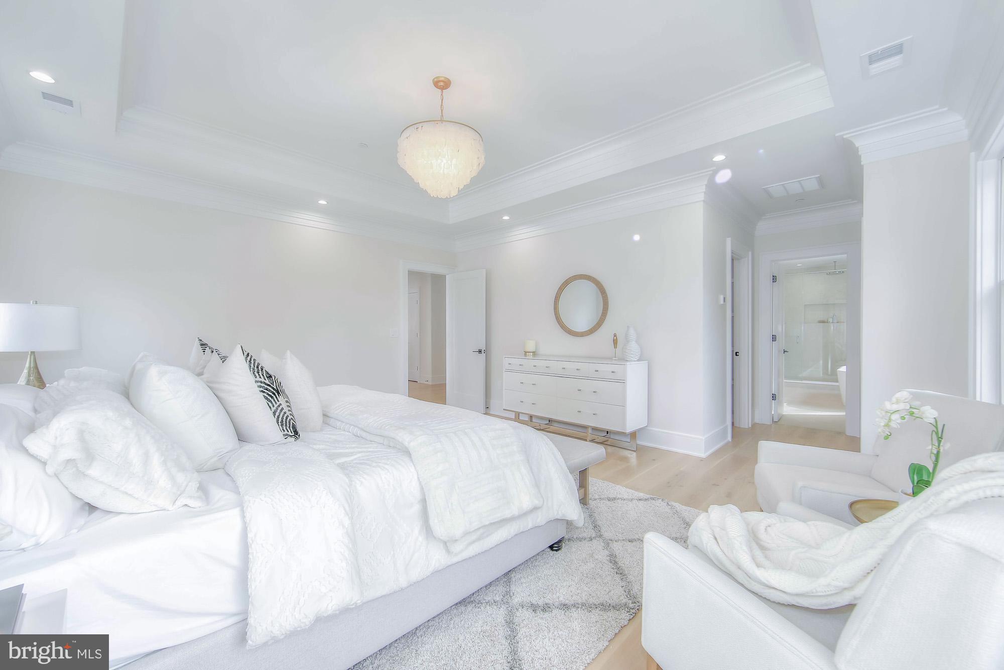 6012 Sonoma Road Bethesda, MD 20817 - Photo 23 of 57 a spacious bedroom with a bed and a cabinets