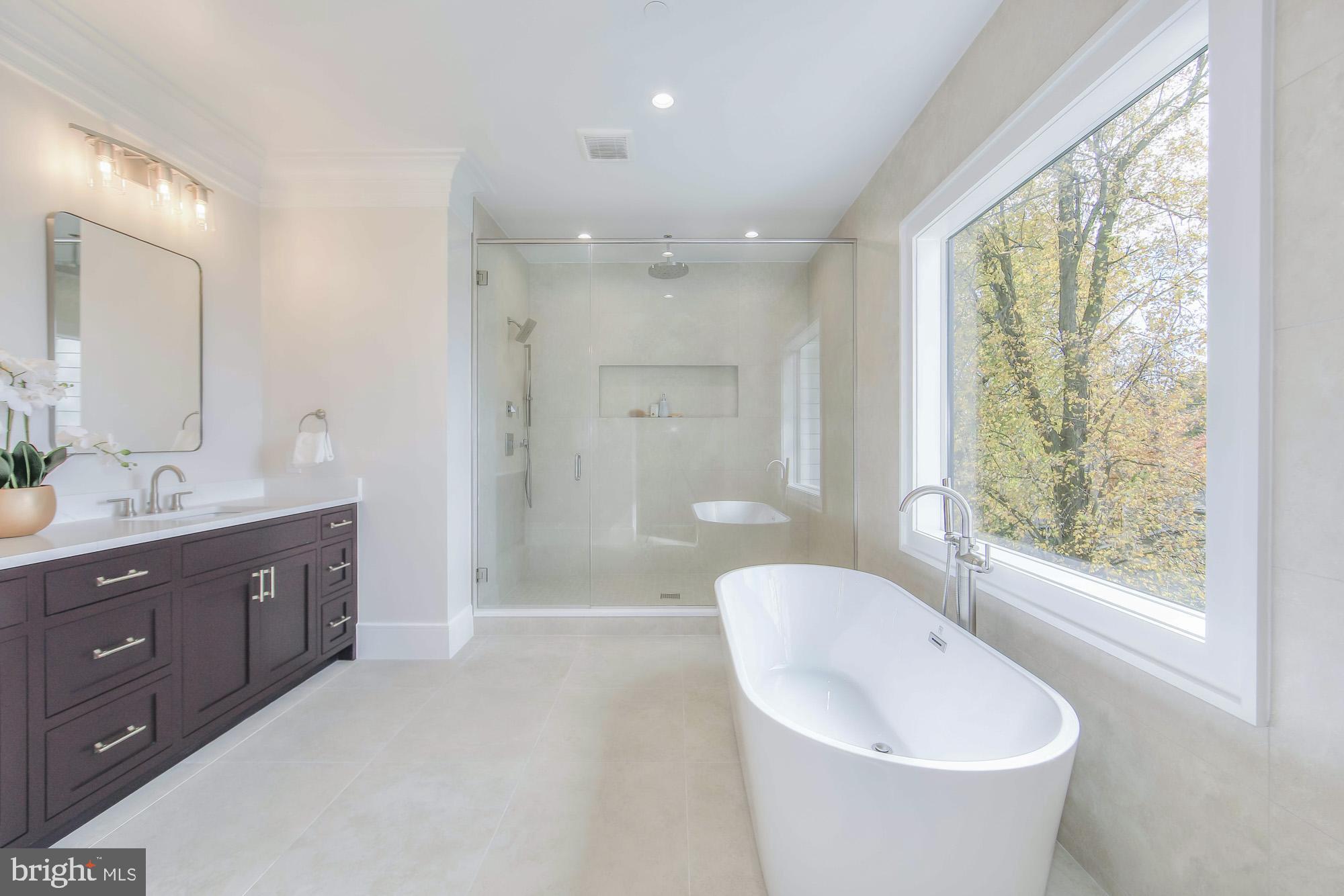 6012 Sonoma Road Bethesda, MD 20817 - Photo 24 of 57 a bathroom with a toilet sink and mirror