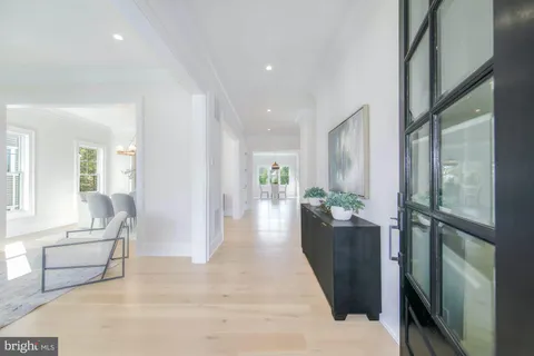 a view of a living room and a wooden floor